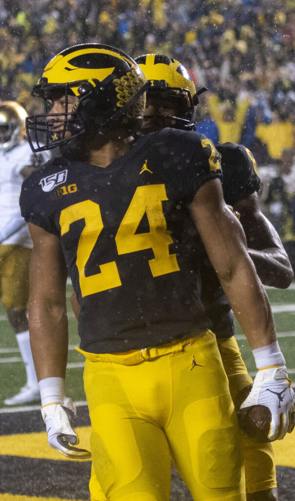Zach Charbonnet in college football action at UCLA