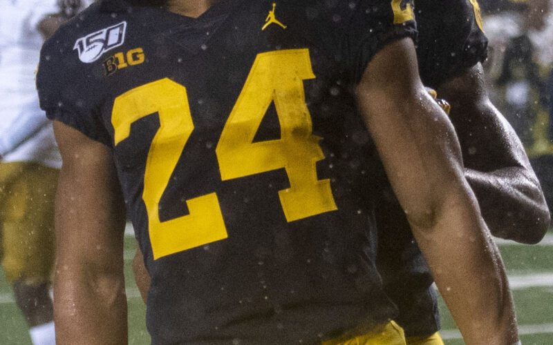 Zach Charbonnet in college football action at UCLA