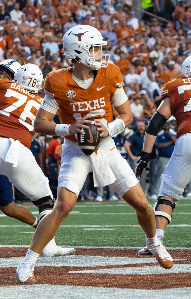 Texas quarterback Arch Manning drops back to pass at Darrell K Royal-Texas Memorial Stadium