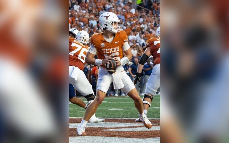 Texas quarterback Arch Manning drops back to pass at Darrell K Royal-Texas Memorial Stadium in Austin.