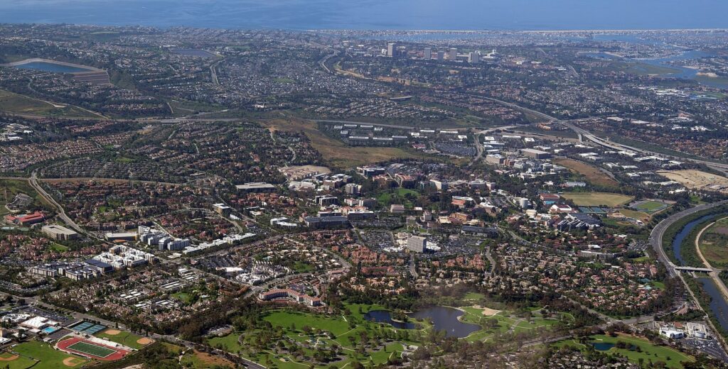 Aerial view of UC Irvine with Newport Beach in the background