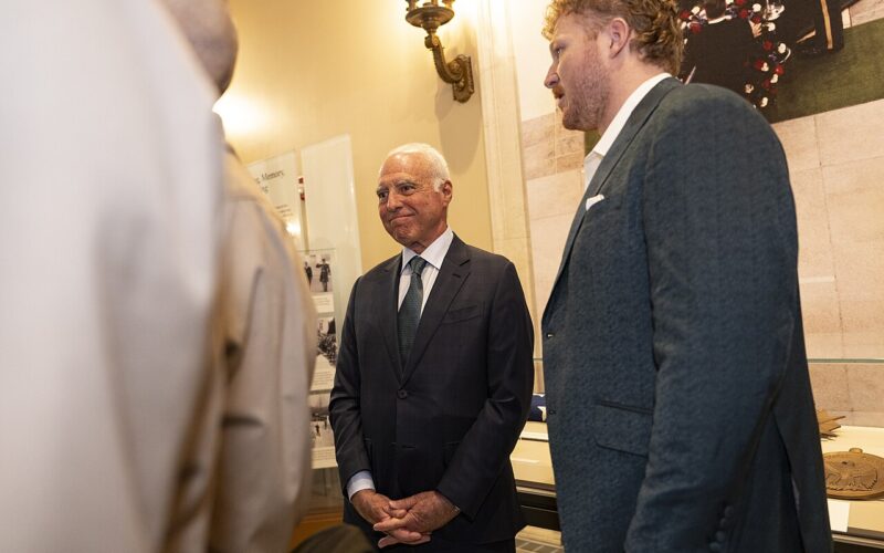 Cam Jurgens at right and Jeffrey Lurie at center during the Eagles’ April 2025 visit to Arlington National Cemetery.