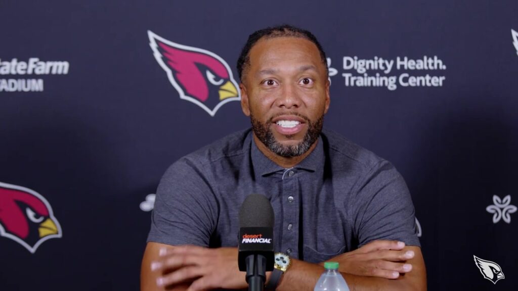 Larry Fitzgerald speaks at an Arizona Cardinals news conference before his Ring of Honor induction