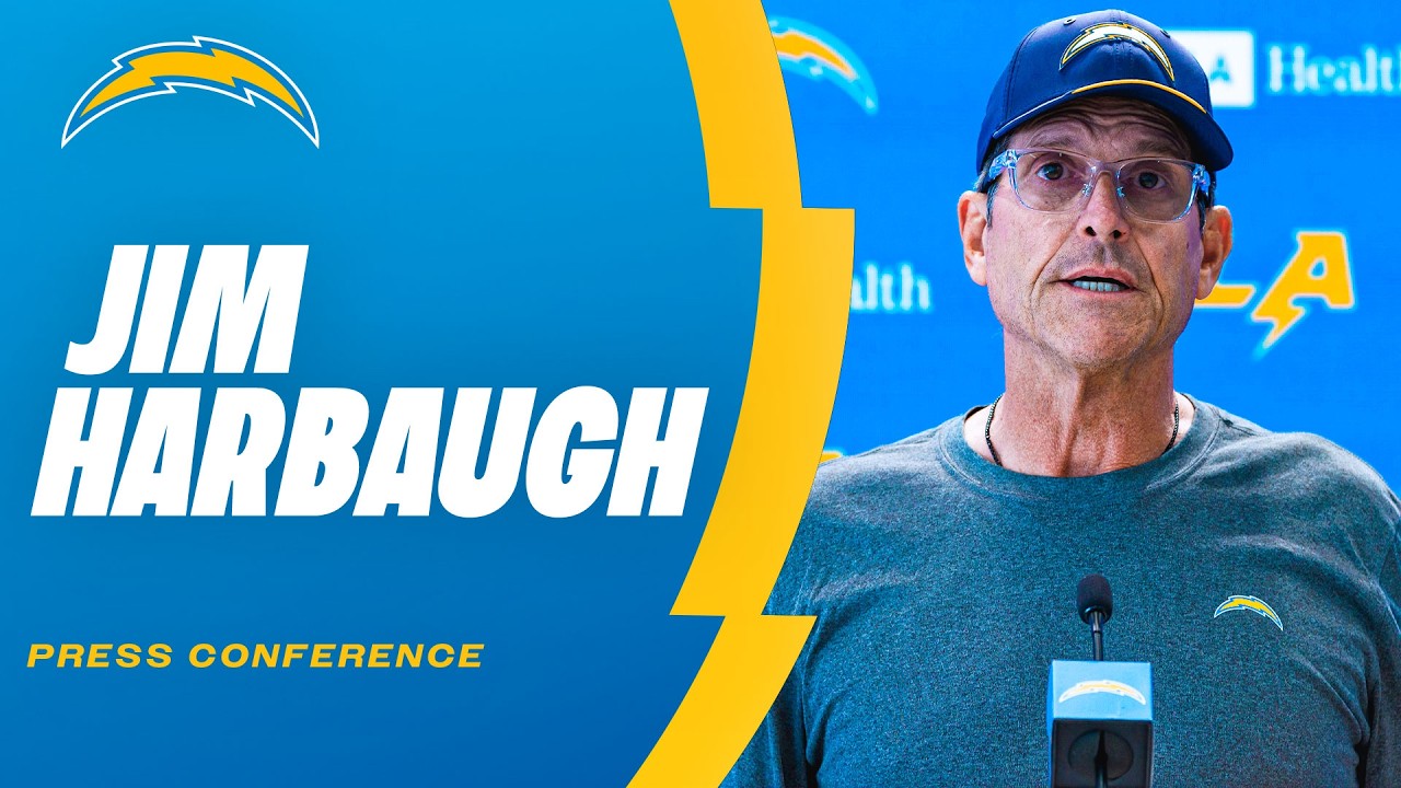Jim Harbaugh speaks to reporters