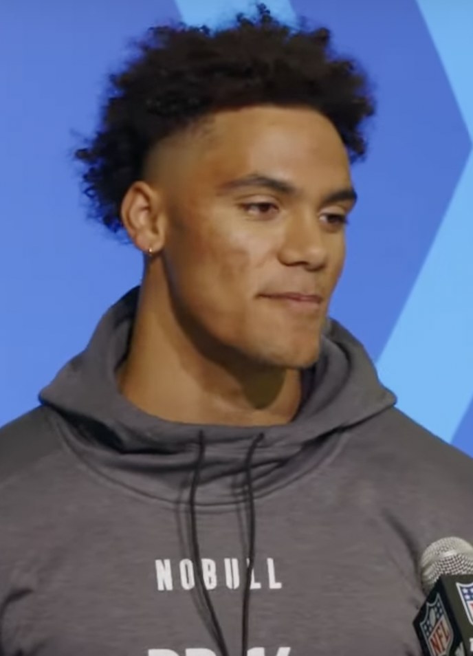 Christian Gonzalez in a sleeveless shirt at the NFL Scouting Combine
