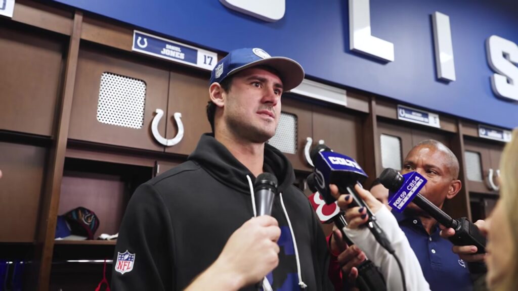 Colts quarterback Daniel Jones speaks to reporters at his locker in Indianapolis