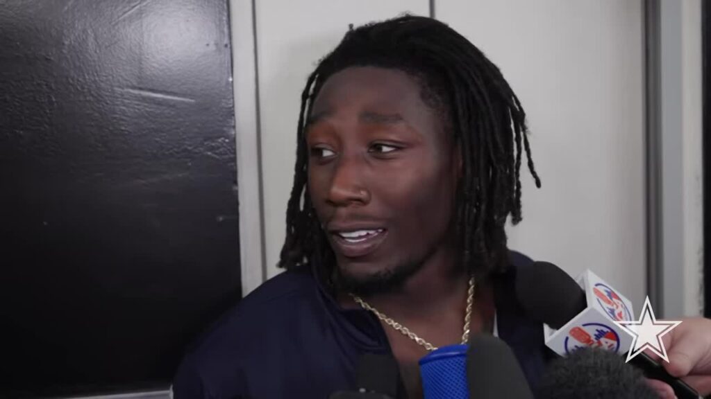 DeMarvion Overshown speaks to reporters in the Cowboys locker room after the win over the Eagles
