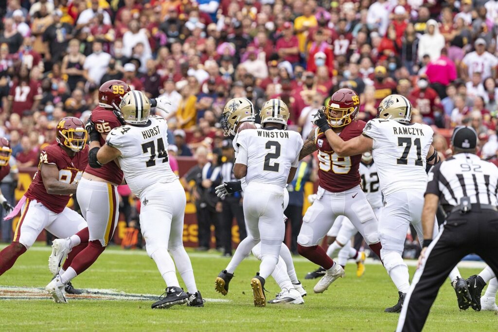Jameis Winston drops back to pass for the New Orleans Saints against Washington in October 2021