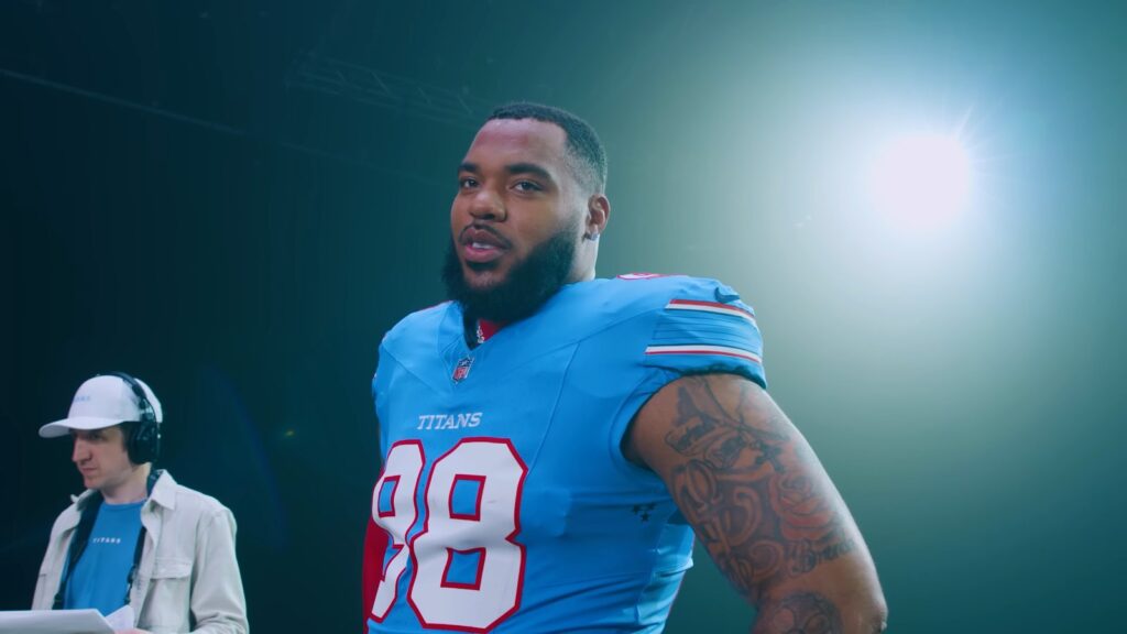 Jeffery Simmons in a light blue Titans No. 98 jersey at the team's 2026 jersey photo shoot