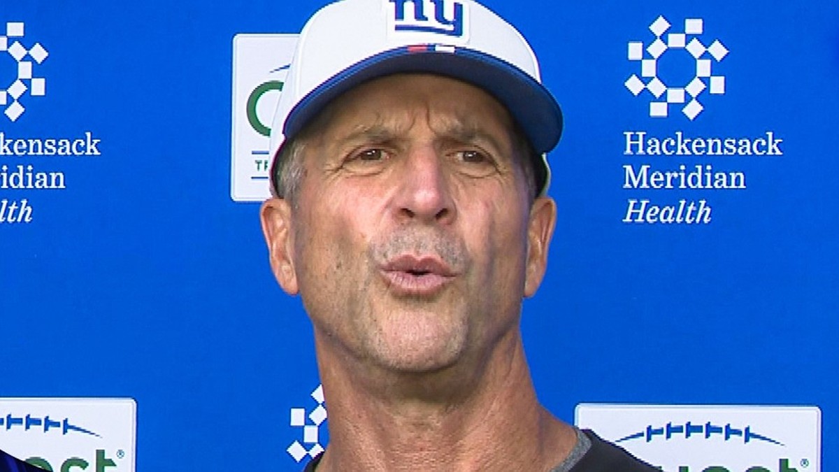 John Harbaugh at a Giants news conference