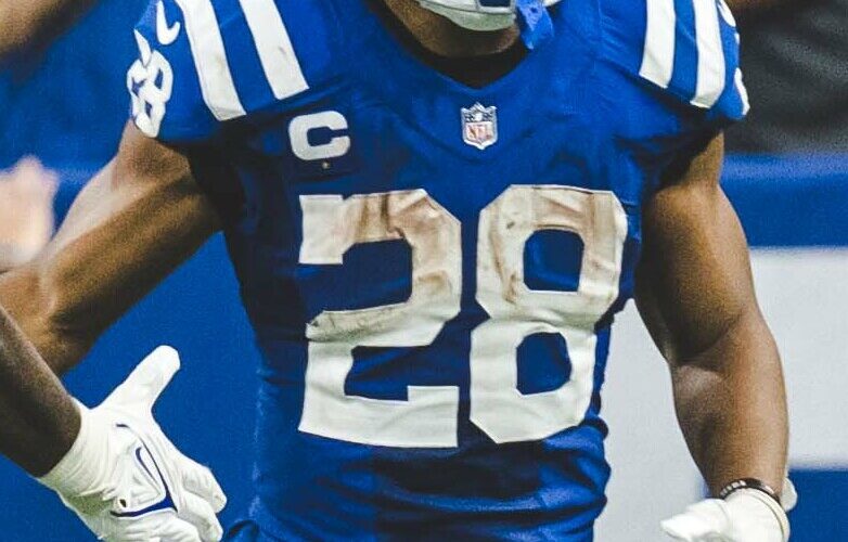 Jonathan Taylor wearing the Indianapolis Colts' blue number 28 uniform during an October 2022 game