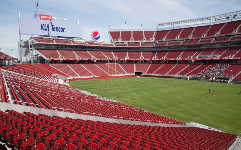 Red seats and the field inside Levi's Stadium in Santa Clara, California.