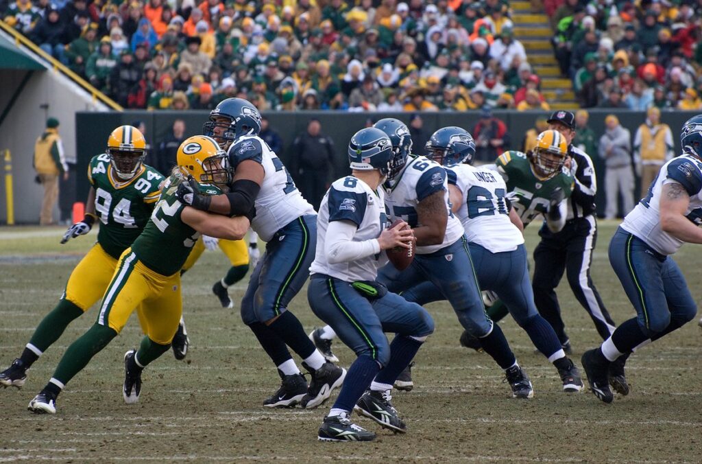 Matt Hasselbeck drops back to pass for the Seahawks at Lambeau Field in December 2009