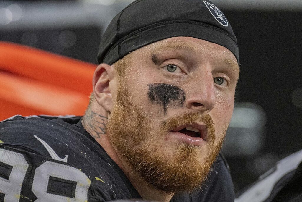 Maxx Crosby of the Las Vegas Raiders on the sideline during a 2021 game