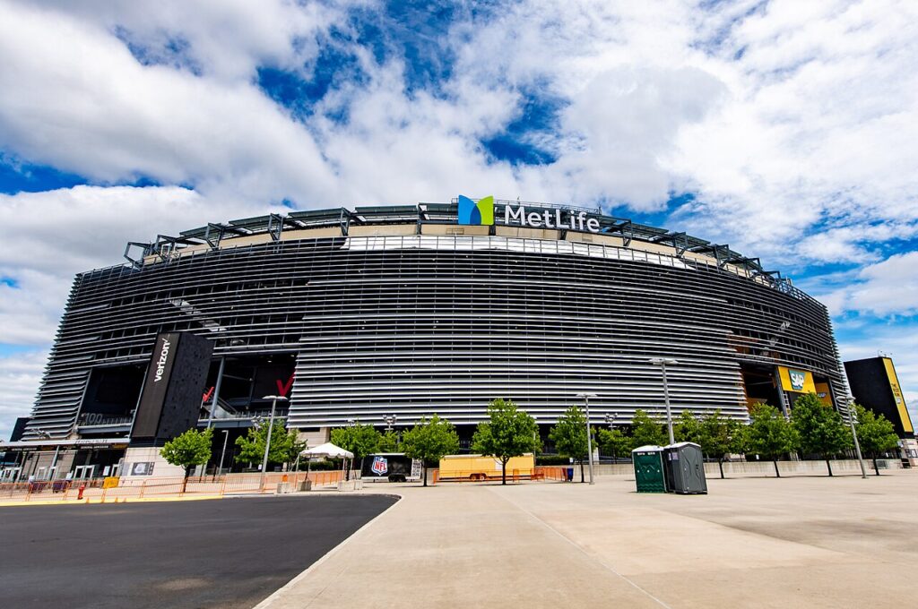 Exterior of MetLife Stadium beneath a partly cloudy sky in September 2022