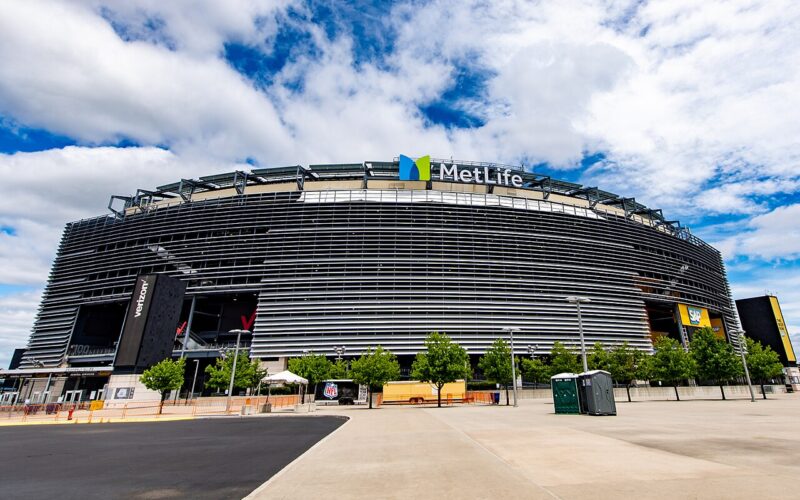 Exterior of MetLife Stadium beneath a partly cloudy sky in September 2022