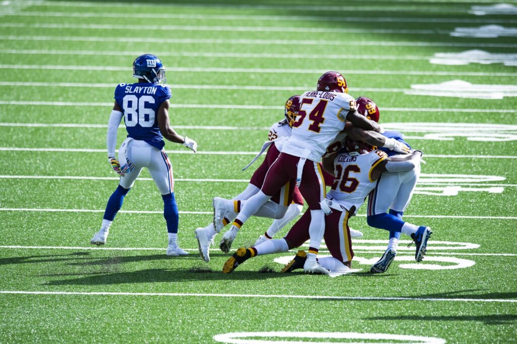Washington safety Landon Collins wraps up a ball carrier during a tackle