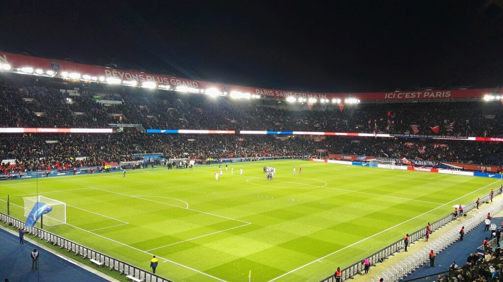 The Parc des Princes in Paris lit up at night during a Paris Saint-Germain match
