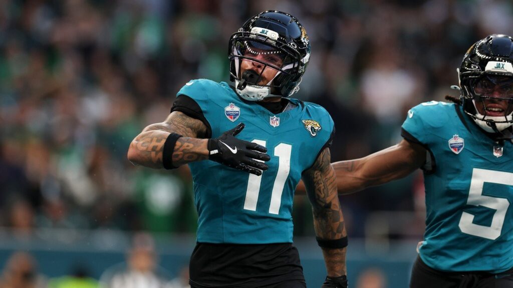 Jaguars receiver Parker Washington, No. 11, celebrates during the London game against the Eagles