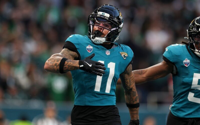 Jaguars receiver Parker Washington, No. 11, celebrates during the London game against the Eagles