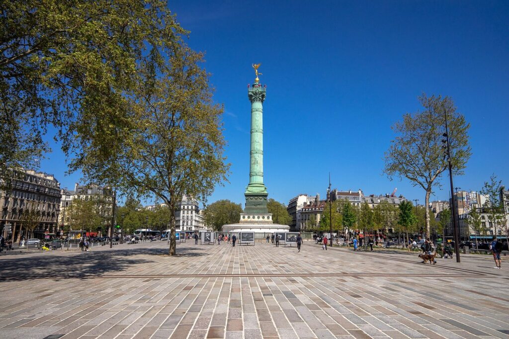 Place de la Bastille in Paris on a sunny day, with the July Column in the centre of the square