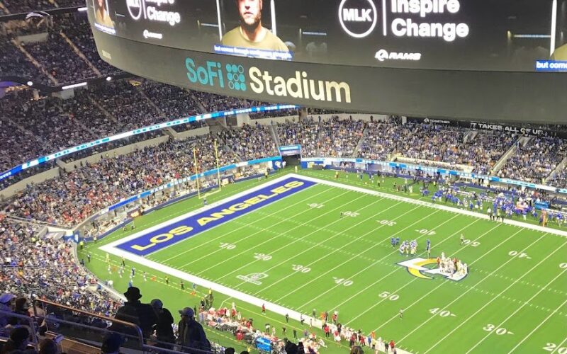 Los Angeles Rams and Arizona Cardinals players on the field at SoFi Stadium