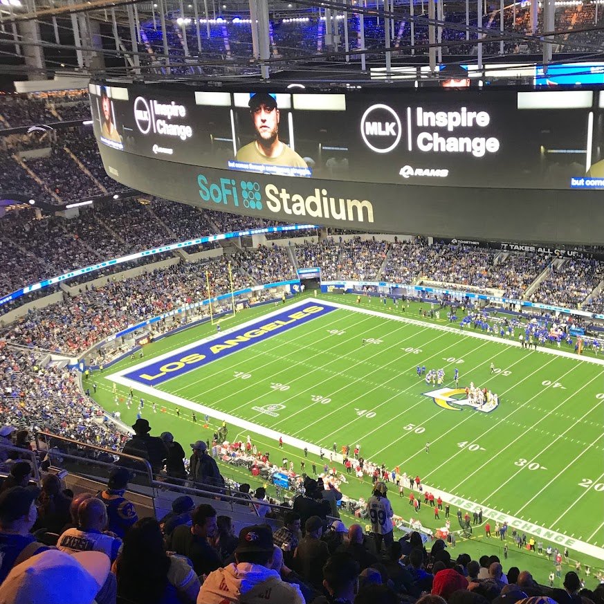 Los Angeles Rams and Arizona Cardinals players on the field at SoFi Stadium