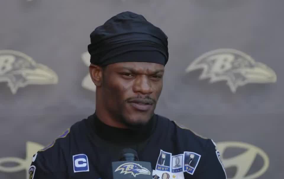 Ravens quarterback Lamar Jackson speaks to reporters before the game at Buffalo