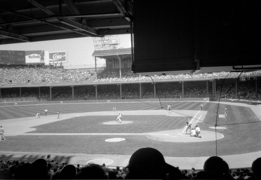 Black-and-white view of the field and double-deck grandstands inside Tiger Stadium in Detroit