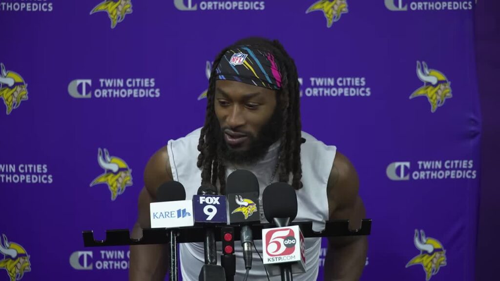 Vikings running back Aaron Jones speaks to reporters before the Lions game
